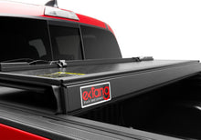 Load image into Gallery viewer, Ex_Xceed_20RedTacoma_PanelFoldBadgeSticker.jpg