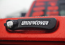Load image into Gallery viewer, UNDUC_EliteLX_Detail_Badge.jpg