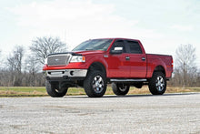 Load image into Gallery viewer, ford-lift-kit_576n2-install-red_1.jpg